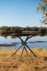 WILDTRAK™ AYR Foldable 4 Leg Stool, Compact, Lightweight, Fishing and Camp Chair, Weight Rated 120kg, Carry Bag with Shoulder Strap